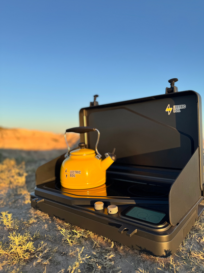 Lectric Boil on the ground during sunset with blue skies. The first portable induction stove and generator with a battery and dual burners for campers, outdoor workers, natural disasters — and anyone, anywhere, cooking or surviving off-grid.
#productimage
#overlander
#lifestyle