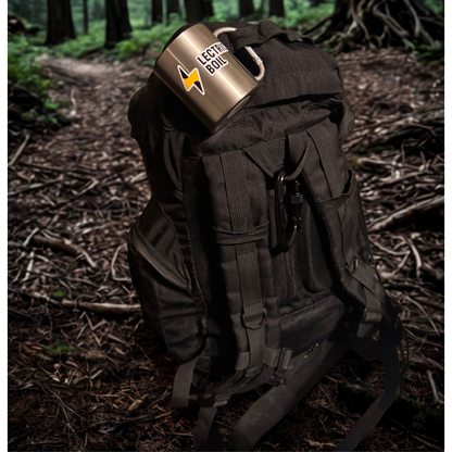 Black backpack on a trail with a metal Lectric Boil mug hanging. The first portable induction stove and generator with a battery and dual burners for campers, outdoor workers, natural disasters — and anyone, anywhere, cooking or surviving off-grid.
#productimage
#lifestyle